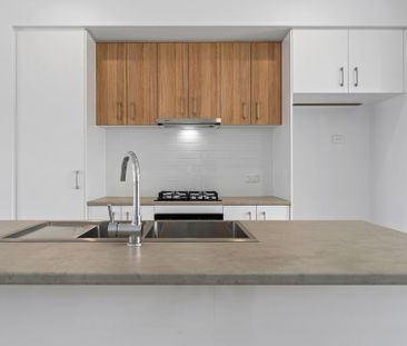 Modern 2-Bedroom Townhouse with Reverse Living & Balcony - Photo 6