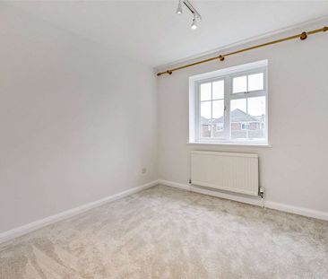 An updated four bedroom detached home located only 1.3 miles to the... - Photo 3