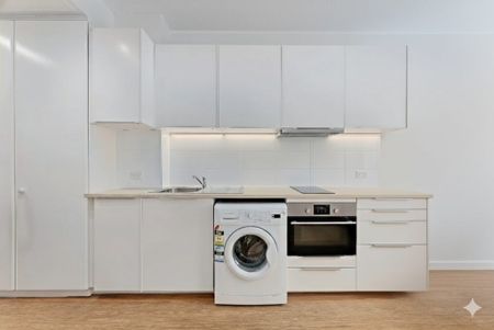 Move-In Ready Studio with Leafy Outlook and Resort Amenities - Photo 3