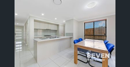 Spacious Family Haven in a Peaceful Neighbourhood - Photo 2