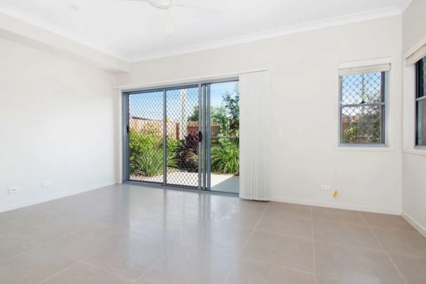 Stylish Three-Bedroom Townhome in Prime Location - Photo 1