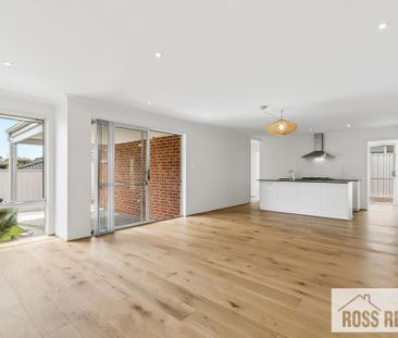 MODERN, SPACIOUS & LOW-MAINTENANCE LIVING - Photo 6