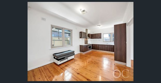 Open the Door to Style, Security, and Location in Woodville South - Photo 1