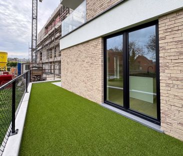 Prachtig gelijkvloersappartement met 2 slaapkamers, ruime tuin en g... - Foto 2