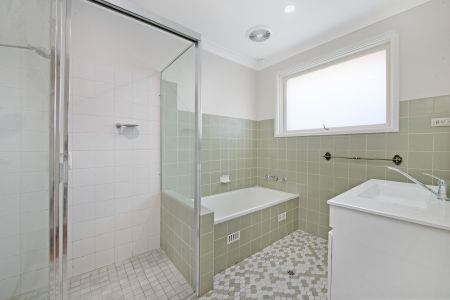 Beautifully Renovated Family Home in Prime Location - Photo 3