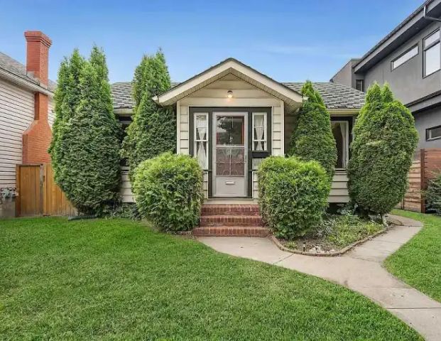 LOCATION! 2 bedroom home with backyard. | 715 4A Street Northwest, Calgary - Photo 1