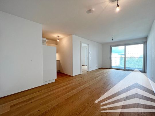 Exklusive 2 Zimmer-Neubauwohnung mit Küche und großem Balkon im KAIfive an der Donaulände - Foto 1