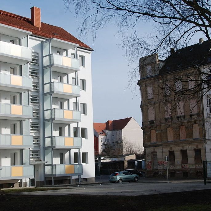 4-Raum-Wohnung mit Balkon und Einbauküche - Foto 1