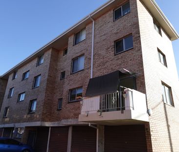 Neat 1st Floor Unit with Train Station across the Road - Photo 4