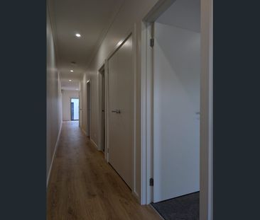 Charming 2-Bedroom Home with Garage in the Heart of Manor Lakes - Photo 2