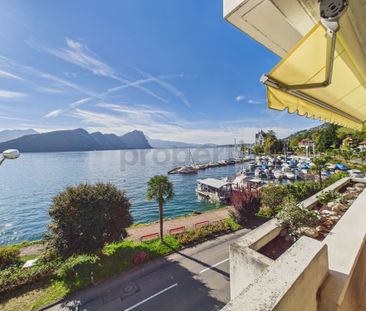 Attractive 2.5-room apartment with lake view in Vitznau - Photo 1