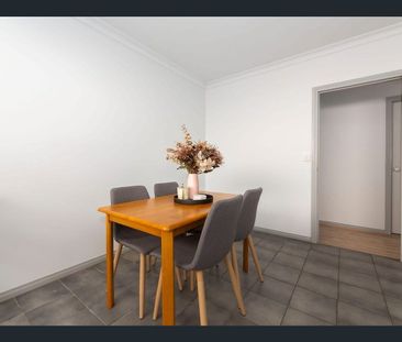 Comfortable Two-Bedroom Home with Garage - Photo 2