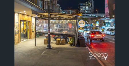 A full brick character home brimming with original charm, offering three spacious bedrooms. - Photo 5