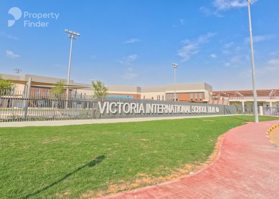 Spacious 3 BR Townhouse in Tilal City with Private Pool - Photo 1