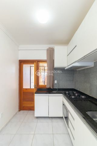 Casa em Condomínio com 2 quartos e 49m² para alugar em Ponta Grossa, Porto Alegre. - Photo 2