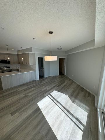 301 - 2306-33 Carringham. Gate NW, Calgary - Photo 2