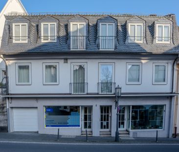 Direkt im Zentrum: 4-Zimmer-Wohnung mit großzügiger Terrasse und vi... - Foto 2