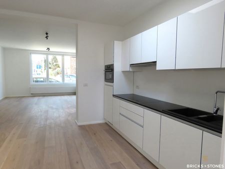Gelijkvloers appartement met tuin en garage - Photo 2