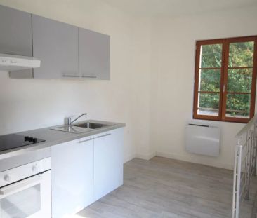 ATYPIQUE F3 AVEC TERRASSE ET PARKING - Photo 2