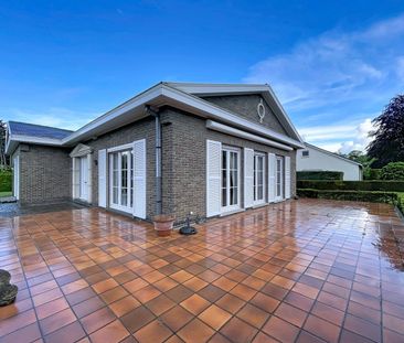Bungalow met 3 SLPKS, garage en tuin in Sint-Martens-Latem - Photo 5