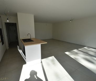 Energiezuinig recent gelijkvloers 2-slpk. appt met terr., tuin en a... - Photo 5
