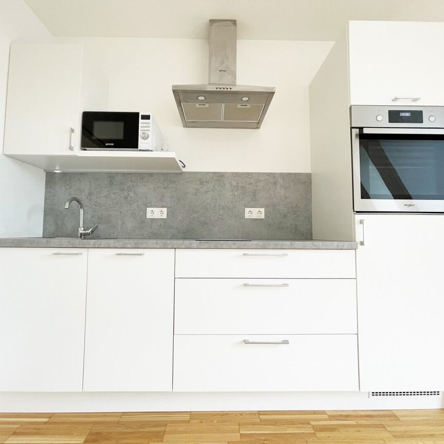 Top moderne Dachgeschosswohnung in Nähe des Flughafens! - Foto 1