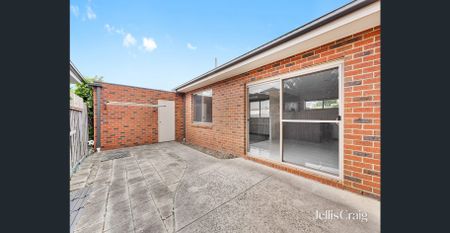 Spacious 2-Bedroom Unit with High Ceilings and Fresh Interiors - Photo 2