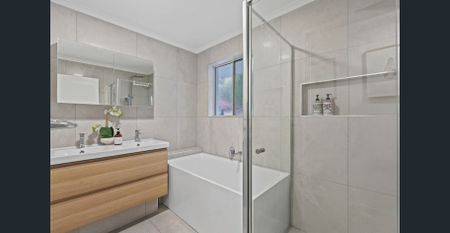 A stylish newly renovated home in one of Wishart's most sought-after pockets, perfectly positioned for families in Mansfield State School Catchment. - Photo 3