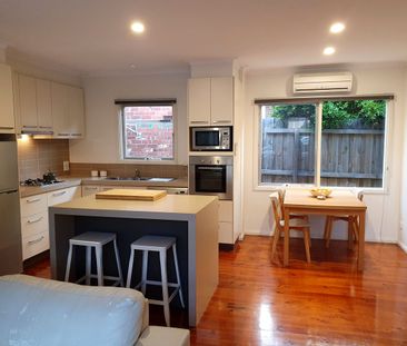 Partly Furnished 2-Bedroom Unit in the Heart of Newtown - Photo 6