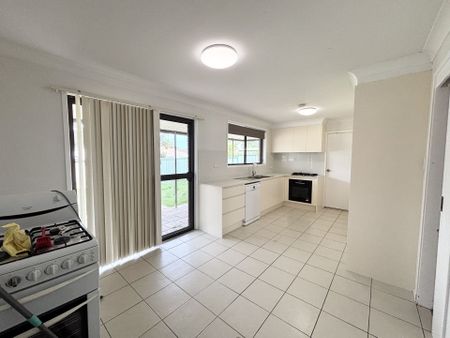 Stylish Family Home in a Peaceful St Helens Park Pocket - Photo 5