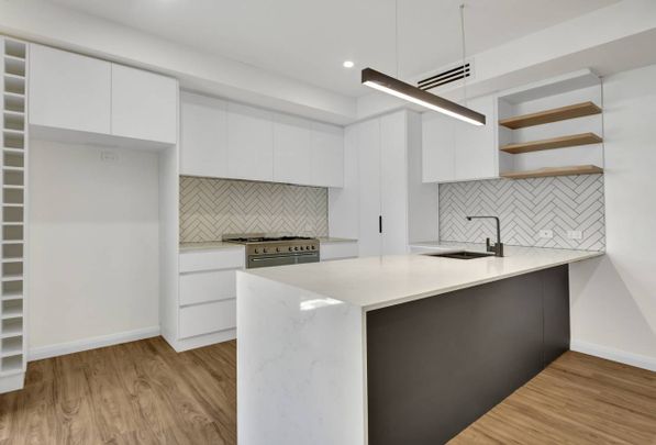 Welcome to Unit 5, 13 Perth Street – a beautifully designed townhouse positioned in one of Rangeville’s most desirable pockets. - Photo 1