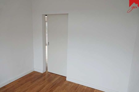 Erdgeschosswohnung in der City mit Garage und Garten! - Foto 4