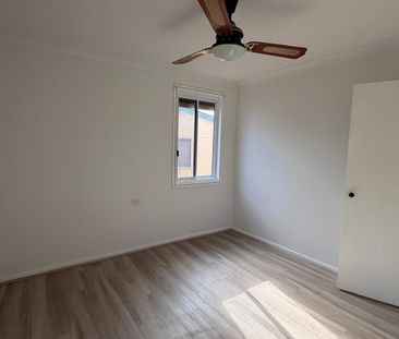 Freshly Renovated 3 bedroom Home with Park aspect - Photo 5