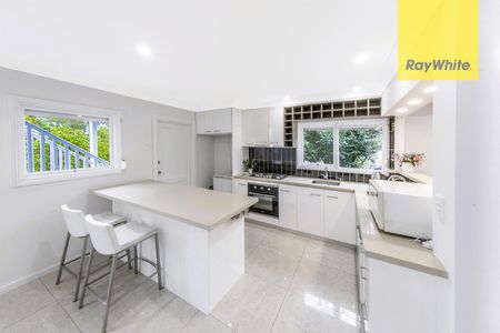 Stunningly Renovated 5-Bedroom Family Oasis with Pool and Garage! - Photo 4