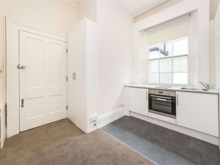 Situated in the desirable location of Cranley Place in the heart of South Kensington, this studio flat has its own kitchenette and shared bathroom facilities. - Photo 4