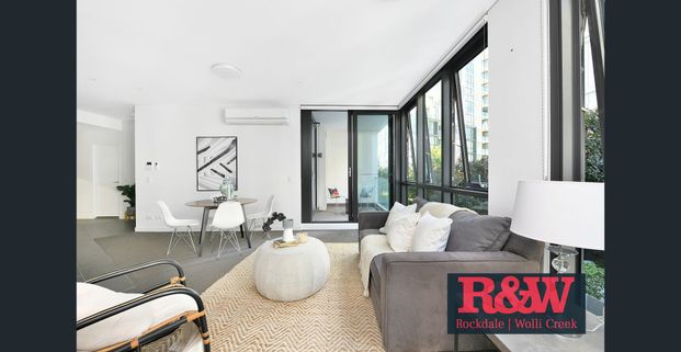 Modern 1-Bedroom Apartment in the Heart of Discovery Point - Photo 1