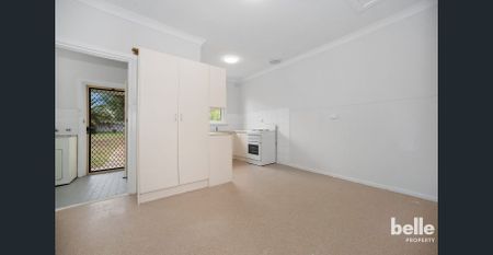 Comfortable 3-Bedroom Home with Spacious Yard in a Convenient Location - Photo 4