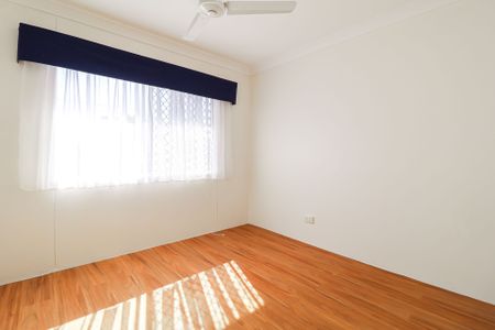 NEAT, TIDY & AIR-CONDITIONED - Photo 2