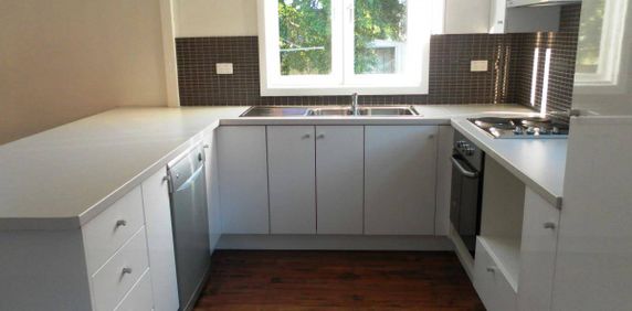 RENOVATED AND WELL LOCATED HOME - Photo 2