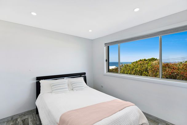 Modern Coastal Retreat with Ocean Views - Photo 1
