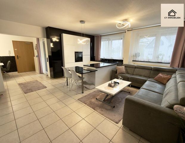 Stilvoll wohnen: 3-Zimmer-Highlight mit offenem Wohnkonzept, 2 Balkonen & Tiefgaragenstellplatz - Foto 1