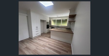 BEAUTIFULLY RENOVATED - Photo 5