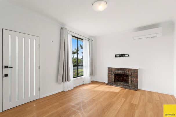 Freshly Renovated 4-Bedroom Home in a Prime Location! - Photo 1