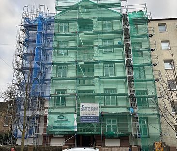 Renovierte 3-Zimmer-Wohnung mit Balkon in zentraler Hanauer Lage (4. OG, kein Aufzug) - Photo 1
