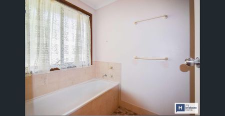 Neat & Tidy Low-set Home with Pool - Photo 4