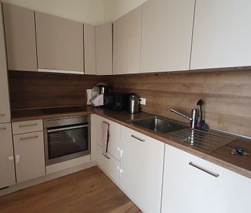 Appartement 2.5 pièces au rez-de-chaussée - Photo 1