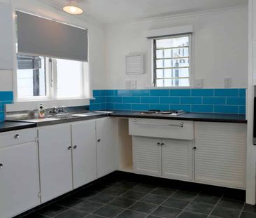 Private Two-Bedroom Home with Sunny Garden & Outdoor Living - Photo 2