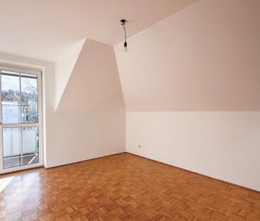 Lichtdurchflutete 3-Zimmer-Dachgeschosswohnung in ruhiger Lage - Photo 2