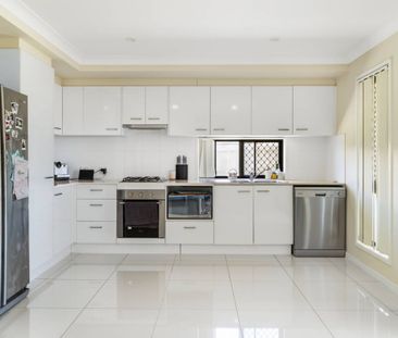 MODERN 2-BEDROOM UNIT IN A SOUGHT AFTER SUBURB - Photo 1