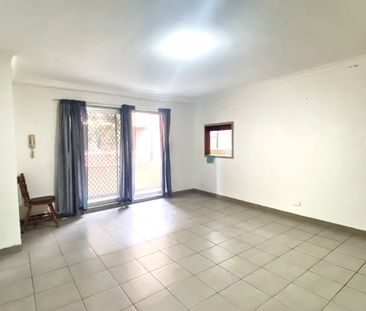 GOOD SIZED 2 BEDROOM UNIT 350M TO AUBURN STATION - Photo 2